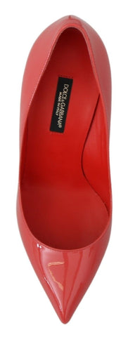 Dark pink patent leather Dolce & Gabbana heels pumps with pointed toes and stiletto heels, stylish and elegant footwear.