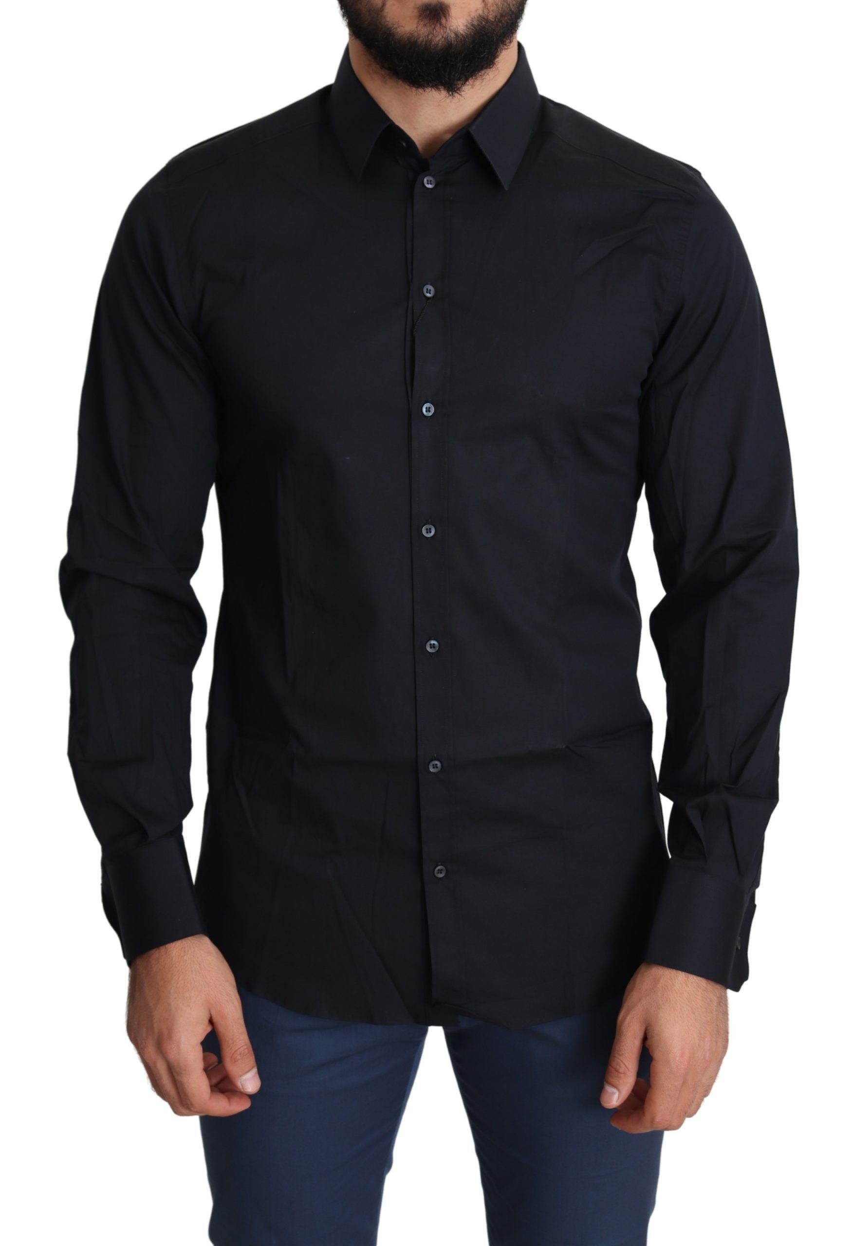 Blue cotton formal dress shirt by Dolce & Gabbana with gold accents, neatly folded with collar and buttons visible.