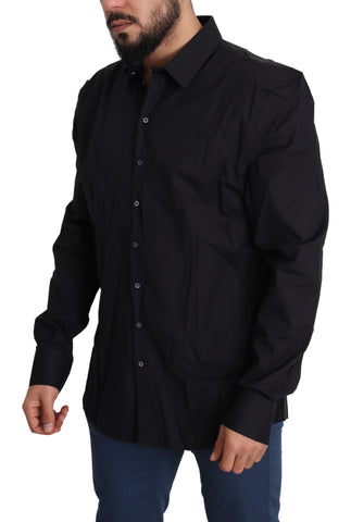 Black cotton stretch Sicily shirt dress by Dolce & Gabbana with a fitted silhouette and classic collar.
