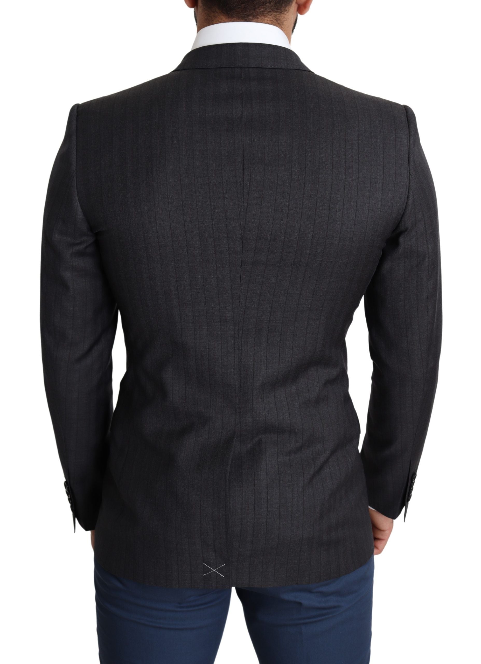 Black wool single-breasted coat by Dolce & Gabbana featuring classic lapels and tailored fit.