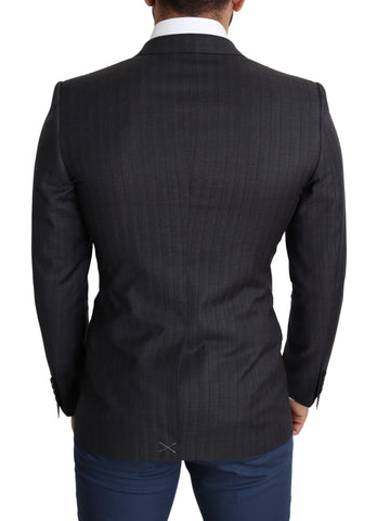 Black wool single-breasted coat by Dolce & Gabbana featuring classic lapels and tailored fit.