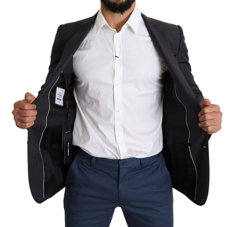 Black wool single-breasted Dolce & Gabbana Martini blazer coat displayed on a hanger.