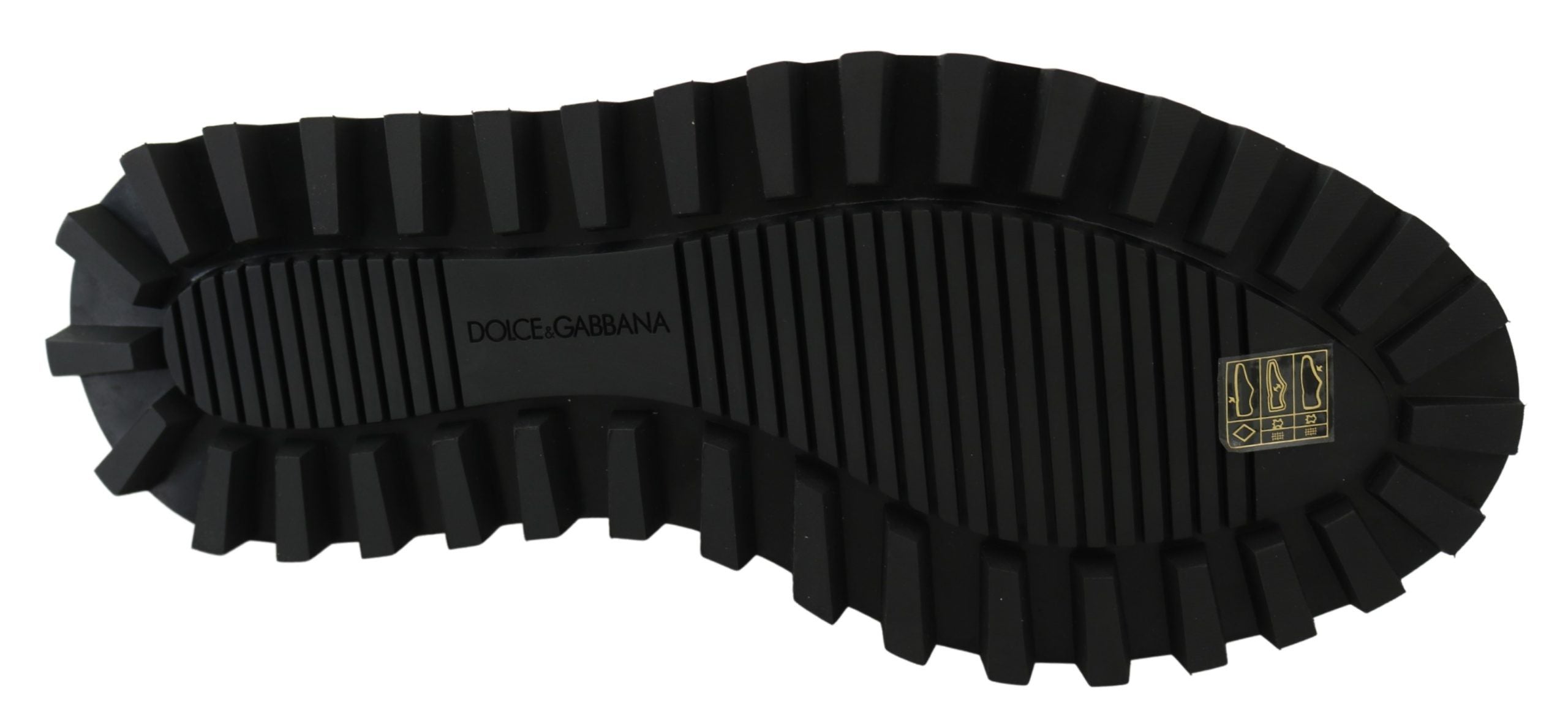 Black rubberized calfskin chunky derby shoes by Dolce & Gabbana with a bold, textured design and sturdy sole.