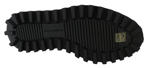 Black rubberized calfskin chunky derby shoes by Dolce & Gabbana with a bold, textured design and sturdy sole.