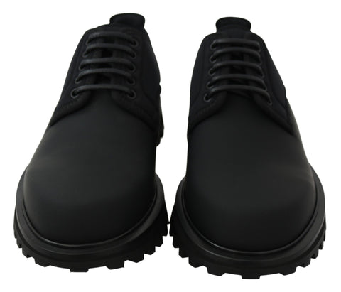 Black rubberized calfskin chunky derby vulcano shoes by Dolce & Gabbana, featuring a bold, textured design and sturdy sole.