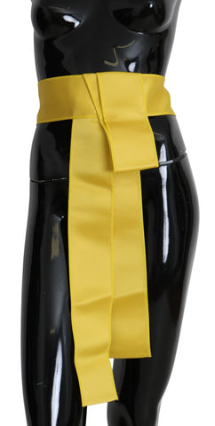 Yellow silk belt with wide snap button closure from Dolce & Gabbana, featuring a smooth, shiny finish and elegant design.