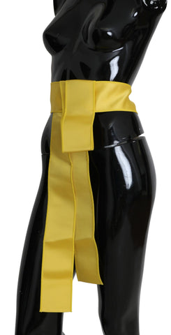 Yellow silk belt with wide snap button closure by Dolce & Gabbana, featuring a smooth fabric and stylish design.