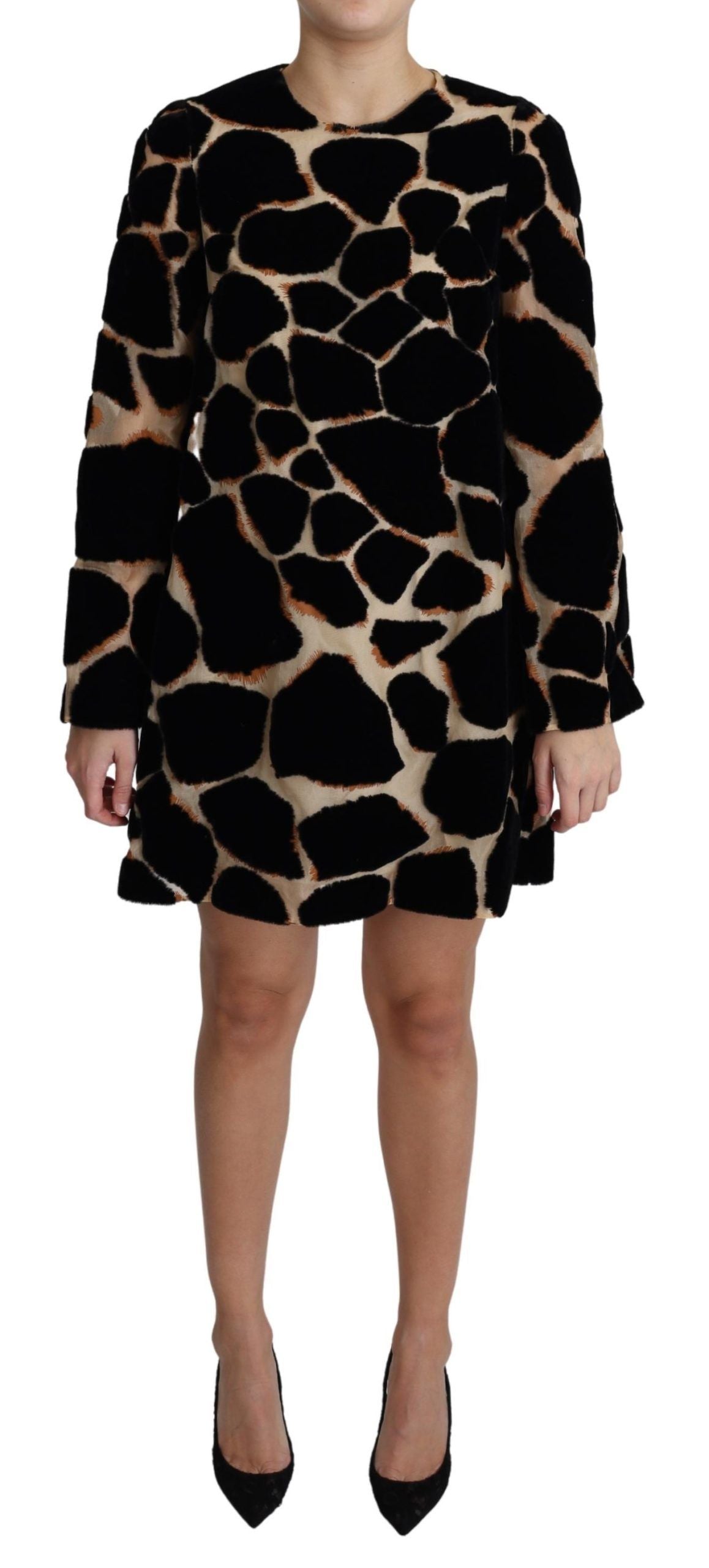 Black Giraffe Print Shift Mini Dress by Dolce & Gabbana, showcasing a stylish dress with giraffe pattern and sleek silhouette.