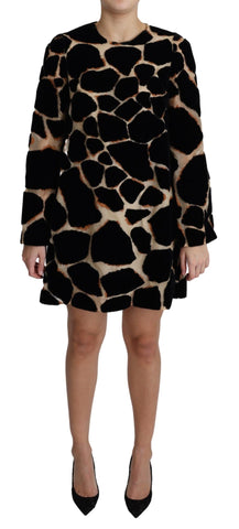 Black Giraffe Print Shift Mini Dress by Dolce & Gabbana, showcasing a stylish dress with giraffe pattern and sleek silhouette.