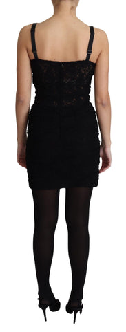 Black lace-up floral corset bustier mini dress by Dolce & Gabbana, featuring intricate lace details and a fitted silhouette.