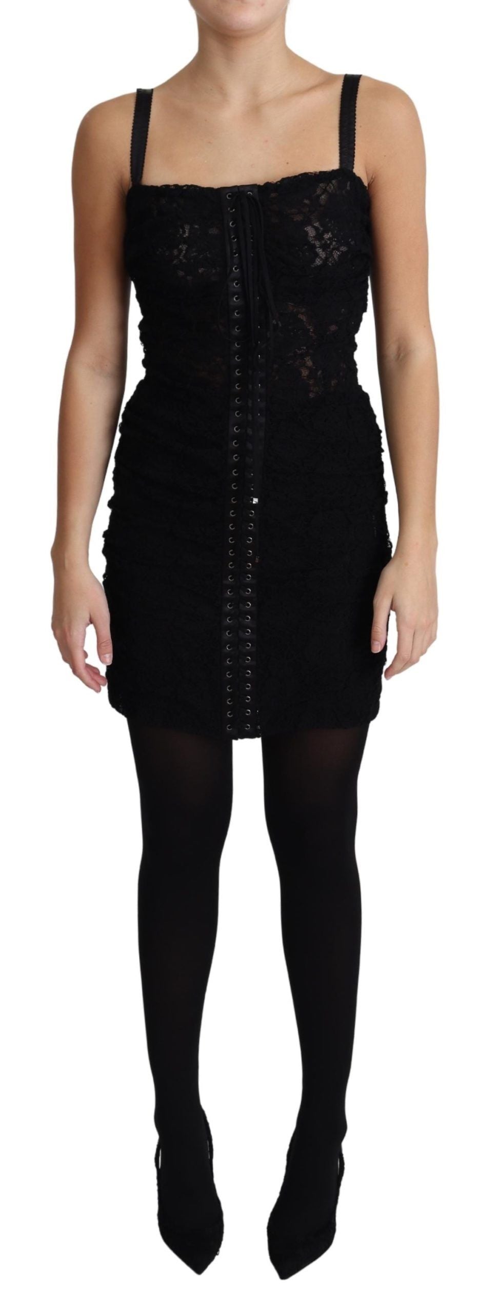 Black lace-up floral corset bustier mini dress by Dolce & Gabbana, featuring intricate lace details and a fitted silhouette.