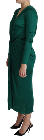 Green fitted silhouette midi dress by Dolce & Gabbana made of viscose fabric, shown on a model.