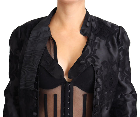 Black lace sheer corset and organza silk jacket by Dolce & Gabbana, featuring intricate lace details and elegant sheer fabric.