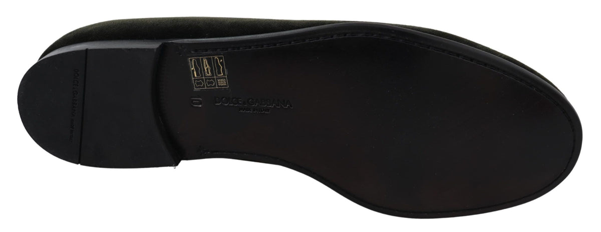 Green velvet men's slip-on loafers by Dolce & Gabbana, showcasing sleek design and luxurious fabric.