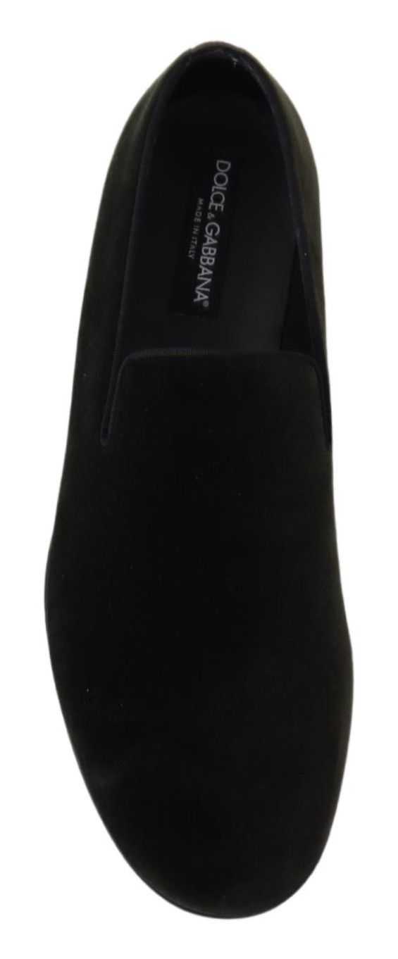 Green velvet men's slip-on loafers by Dolce & Gabbana, showcasing sleek design and luxurious fabric.