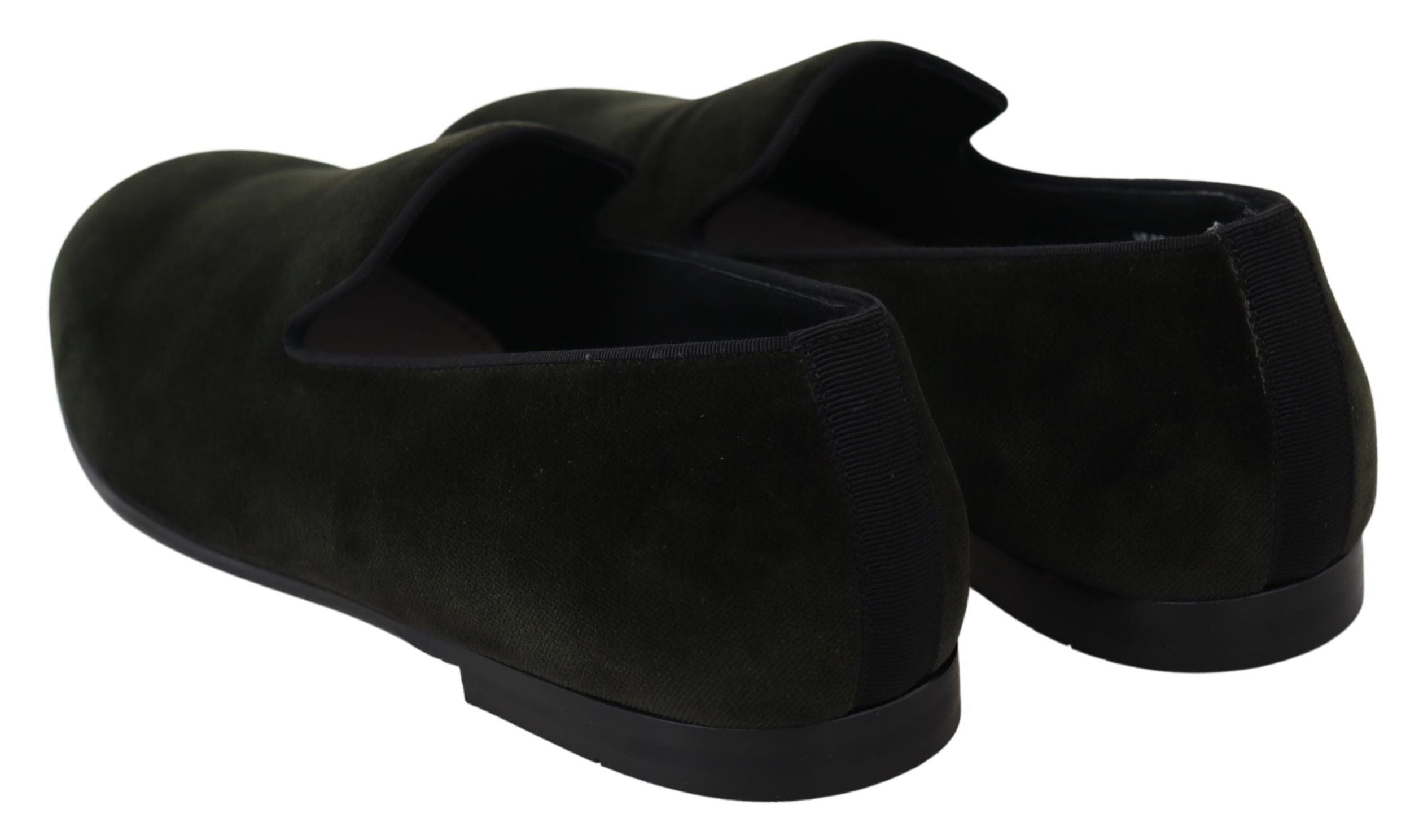 Green velvet men's slip-on loafers by Dolce & Gabbana, showcasing sleek design and plush material.