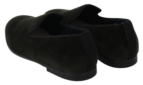 Green velvet men's slip-on loafers by Dolce & Gabbana, showcasing sleek design and plush material.