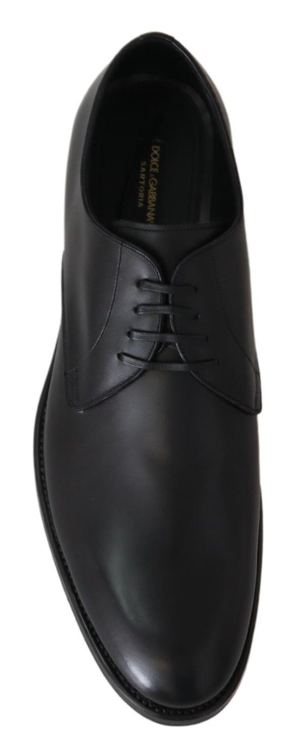 Black leather SARTORIA handmade shoes by Dolce & Gabbana, featuring sleek design and detailed craftsmanship.