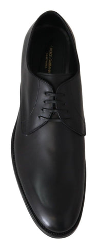 Black leather SARTORIA handmade shoes by Dolce & Gabbana, featuring sleek design and detailed craftsmanship.