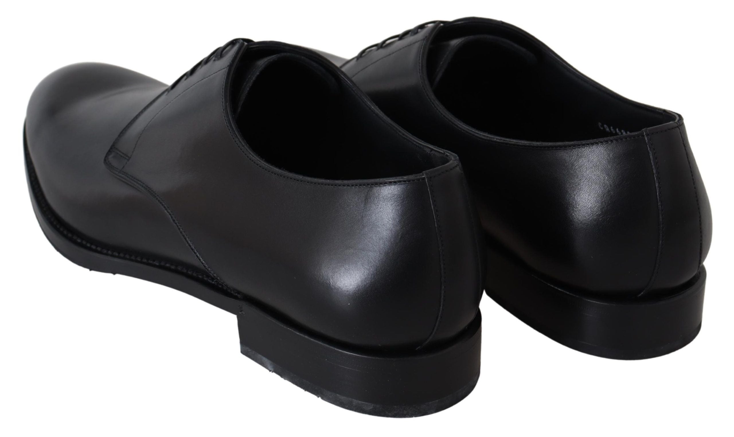 Black leather SARTORIA hand-made shoes by Dolce & Gabbana, featuring sleek design and detailed craftsmanship.