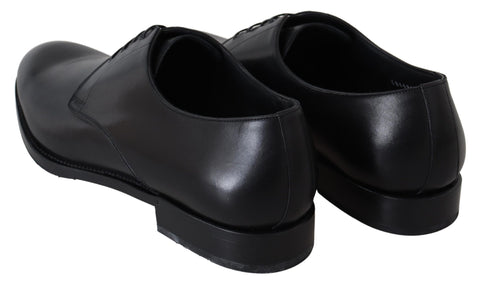 Black leather SARTORIA hand-made shoes by Dolce & Gabbana, featuring sleek design and detailed craftsmanship.