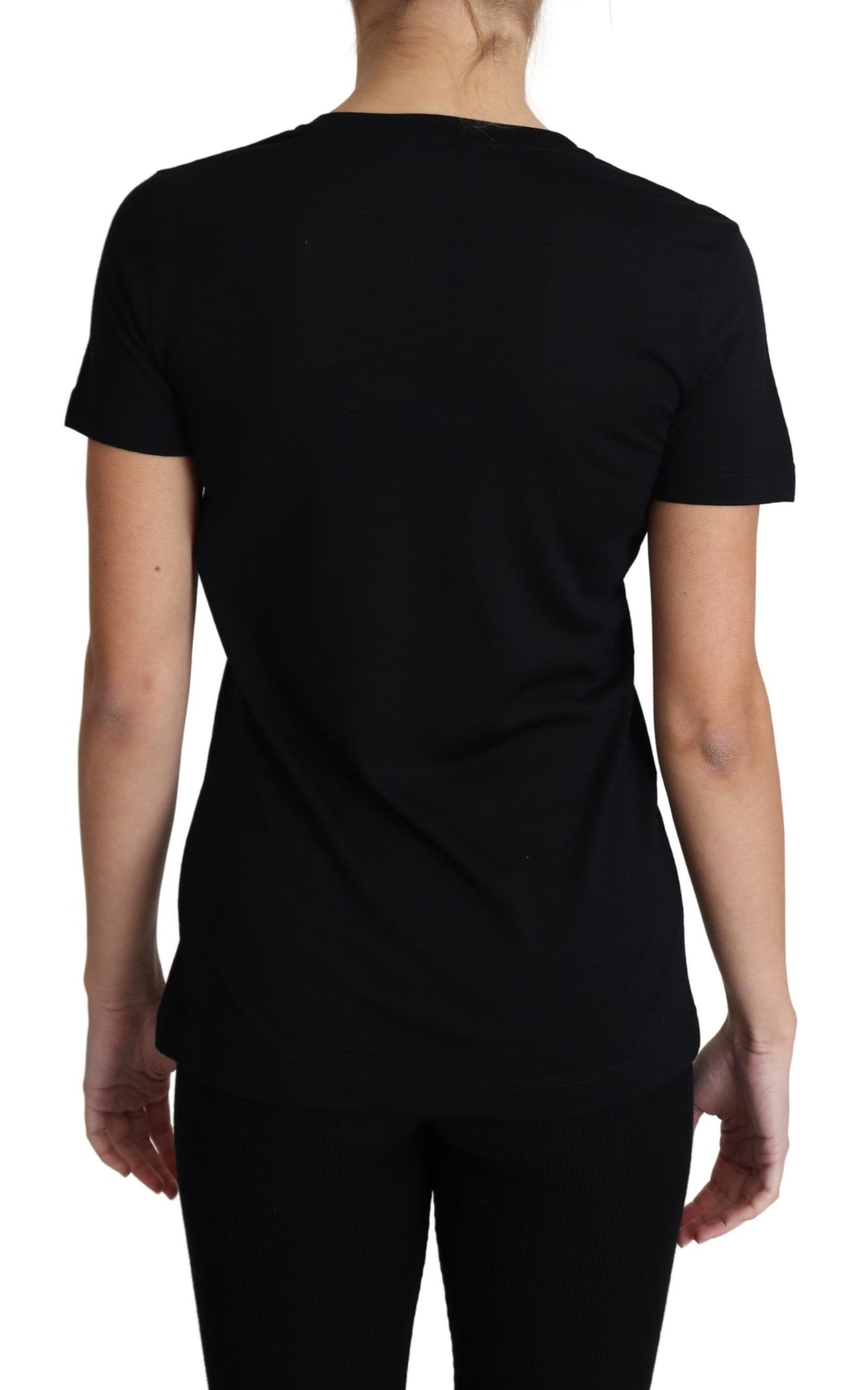 Black wool Dolce & Gabbana round neck short sleeve T-shirt displayed on a hanger.