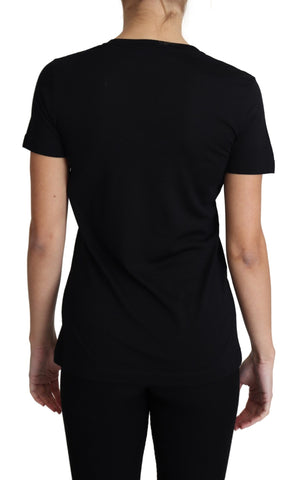 Black wool Dolce & Gabbana round neck short sleeve T-shirt displayed on a hanger.