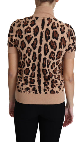 Beige leopard print Virgin wool turtleneck top by Dolce & Gabbana showing the textured fabric and stylish fit.