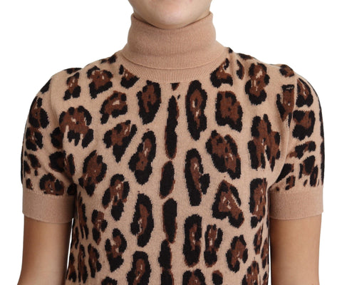 Beige leopard print virgin wool turtleneck top by Dolce & Gabbana, close-up showing soft fabric and stylish design.