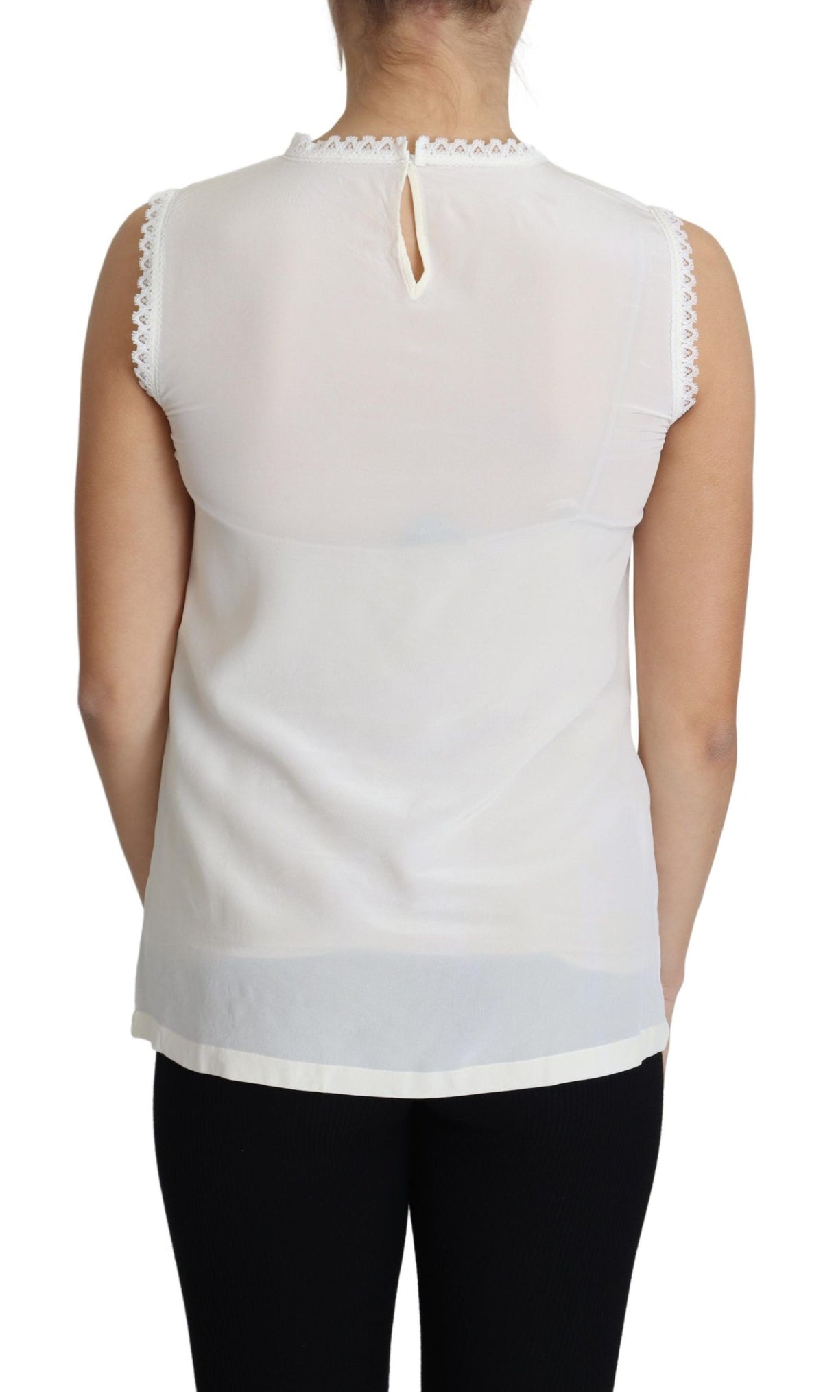 White silk sleeveless blouse with lace trim by Dolce & Gabbana, featuring a elegant, fitted design and delicate lace detailing.