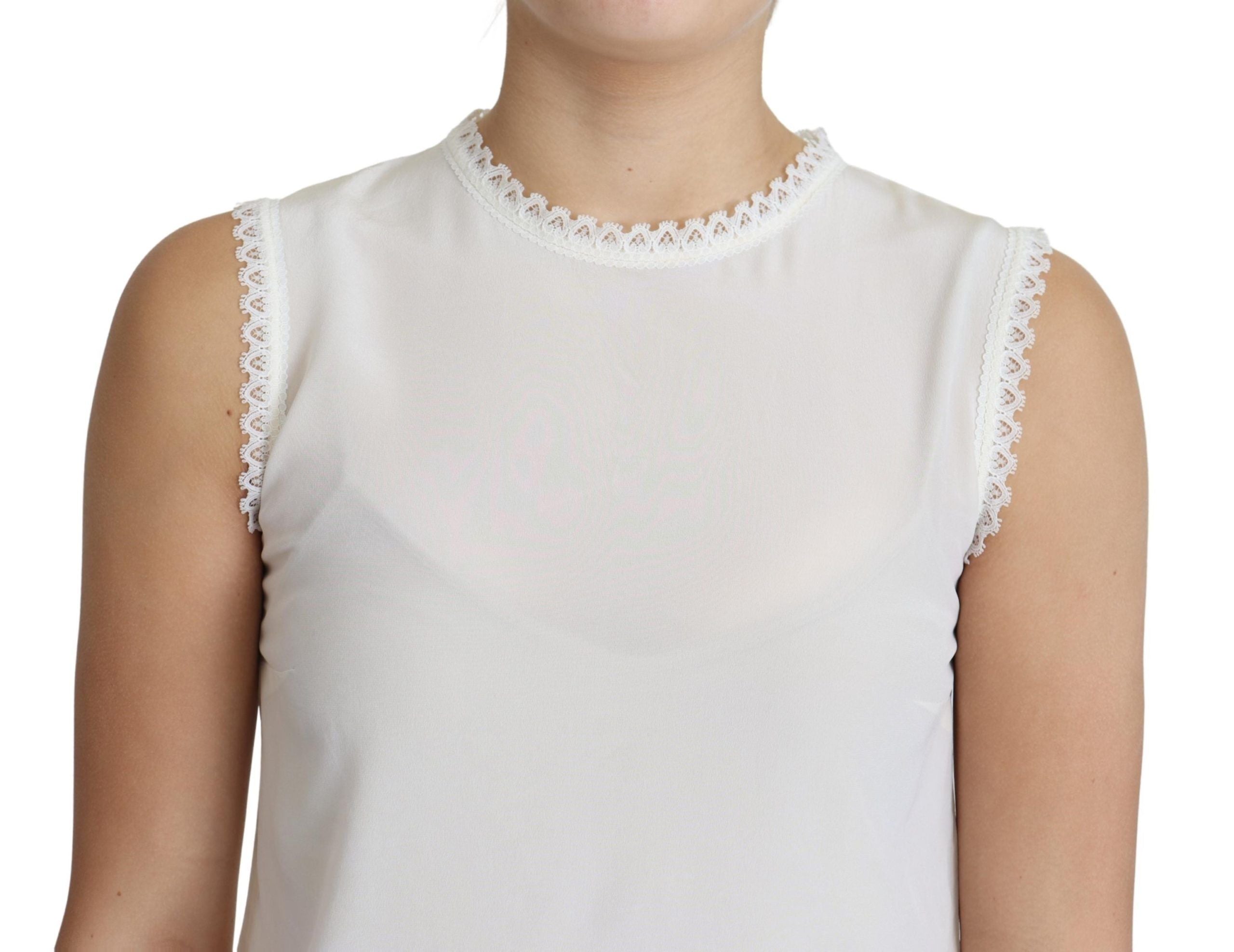 White silk sleeveless blouse with lace trim from Dolce & Gabbana, featuring a classic fit and elegant design.