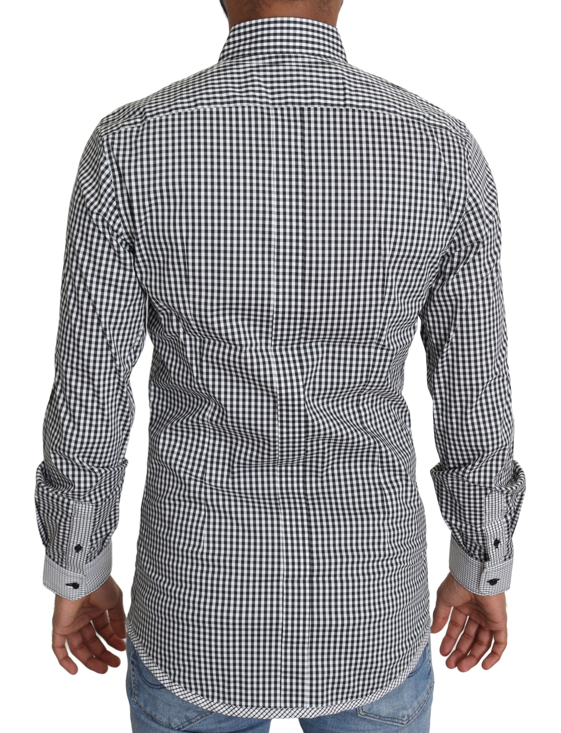 Black and white checkered casual shirt by Dolce & Gabbana, featuring a classic button-up design and tailored fit.