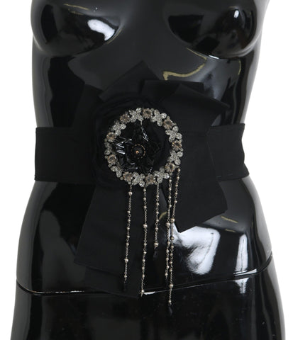 Black crystal brooch and wide Wai SATORIA belt by Dolce & Gabbana, featuring intricate crystal detailing and elegant design.