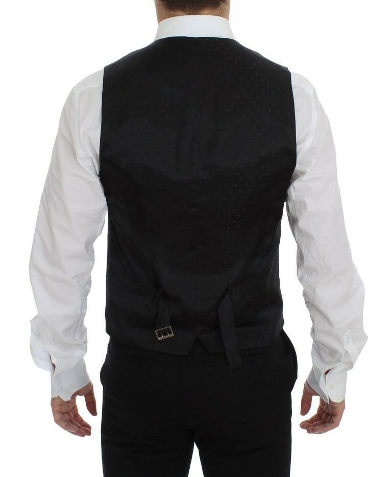 Black wool logo dress gilet vest by Dolce & Gabbana, showing textured fabric and sleek design on a mannequin.