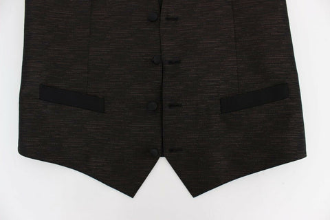 Black wool logo dress gilet vest by Dolce & Gabbana, featuring a sleek fit and minimalist design, displayed on a mannequin.