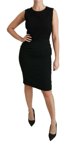 Black floral lace sheath gown dress by Dolce & Gabbana with intricate lace details and a fitted silhouette.