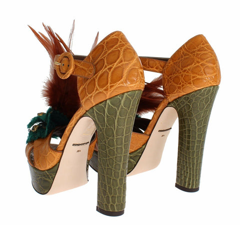 Orange leather platform sandal shoes with crystal embellishments by Dolce & Gabbana, featuring strappy design and chunky heel.
