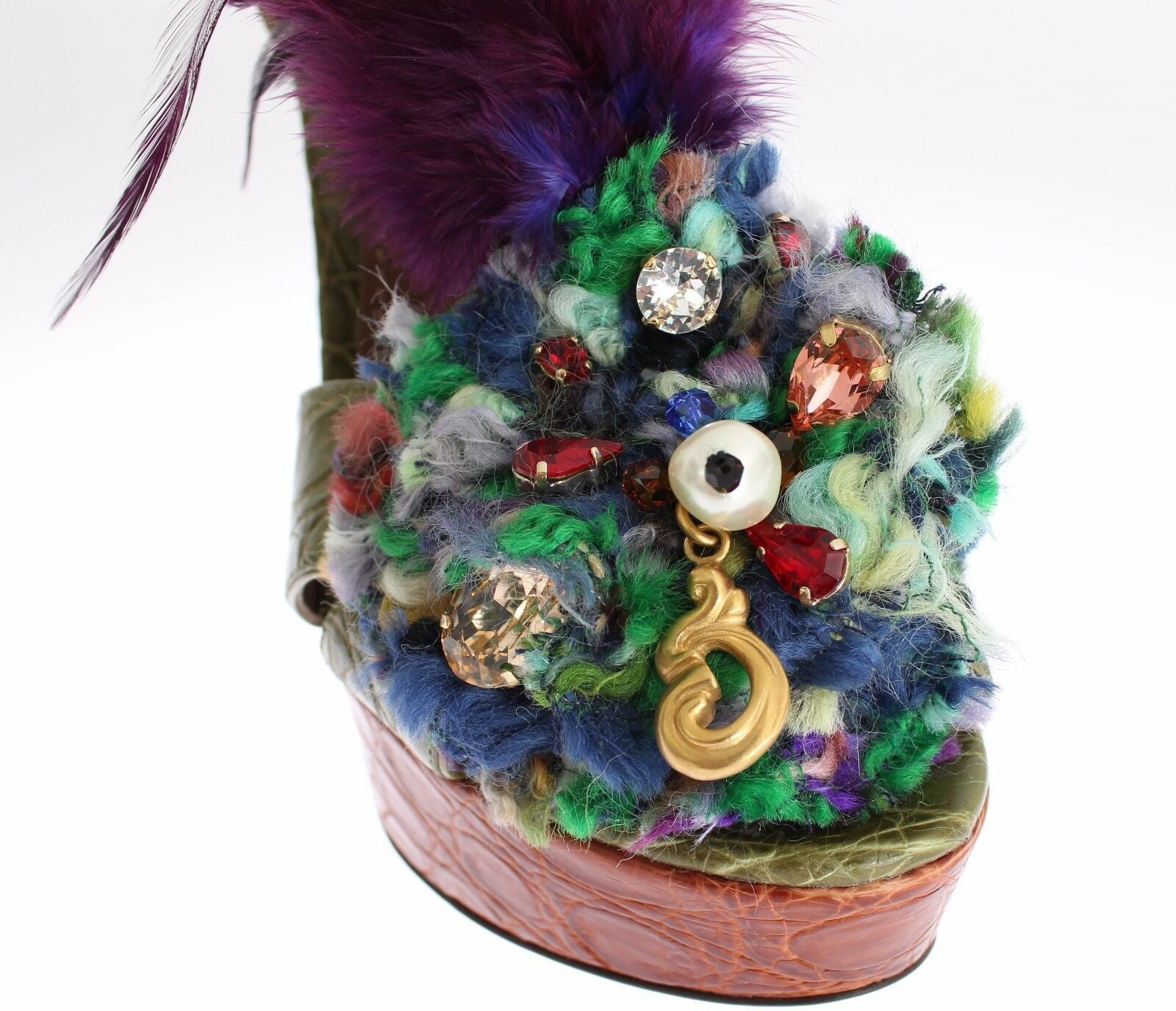 Green leather platform sandal shoes with crystal embellishments by Dolce & Gabbana, featuring a stylish open-toe design.