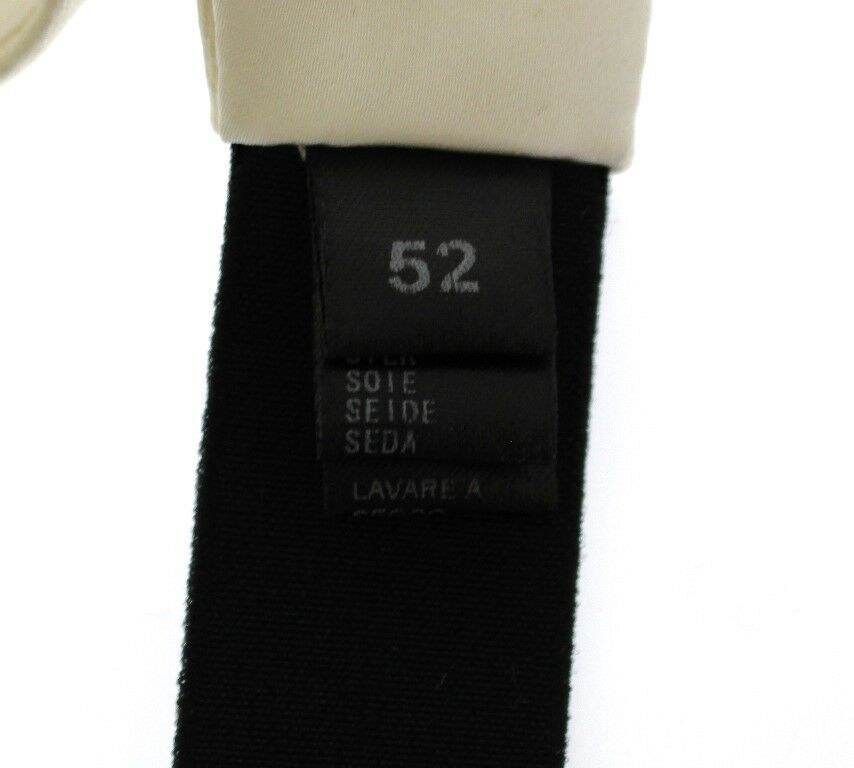 White silk waist cummerbund belt by Dolce & Gabbana, with smooth fabric and elegant design, detailed close-up shot.