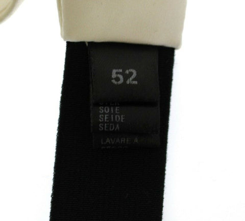 White silk waist cummerbund belt by Dolce & Gabbana, with smooth fabric and elegant design, detailed close-up shot.
