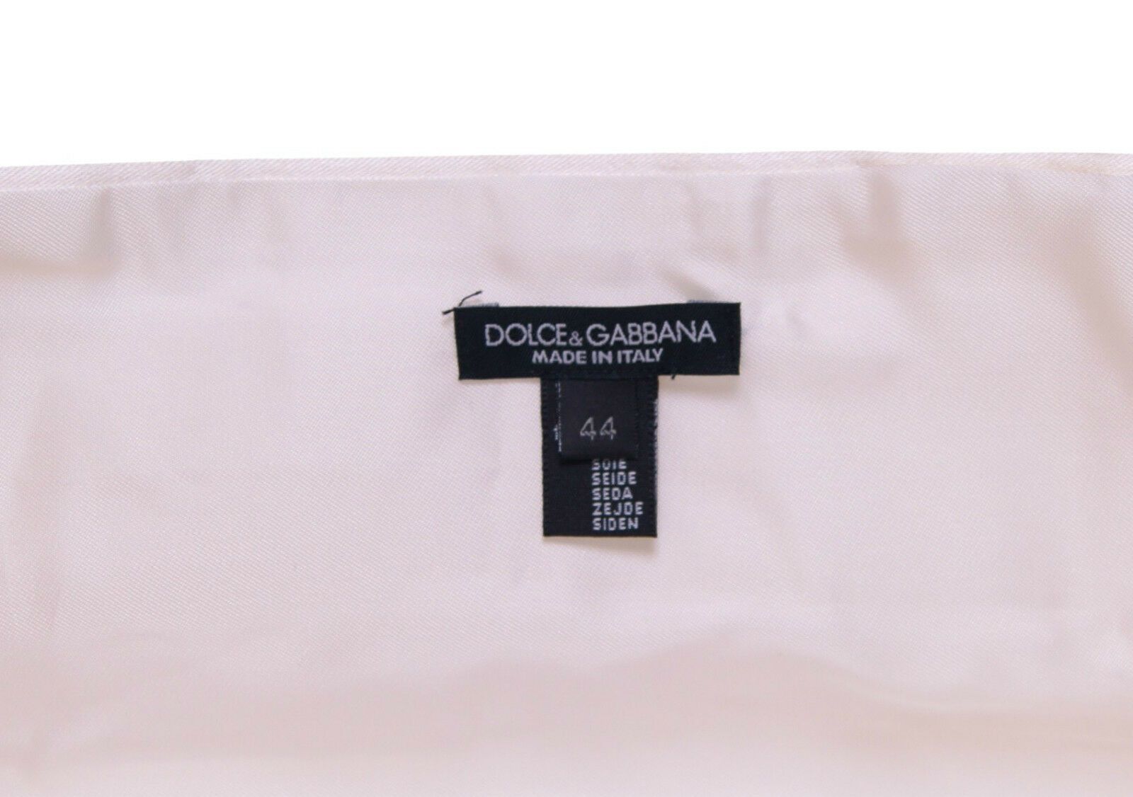 White Dolce & Gabbana waist tuxedo cummerbund with smooth fabric and elegant design for formal evening wear.