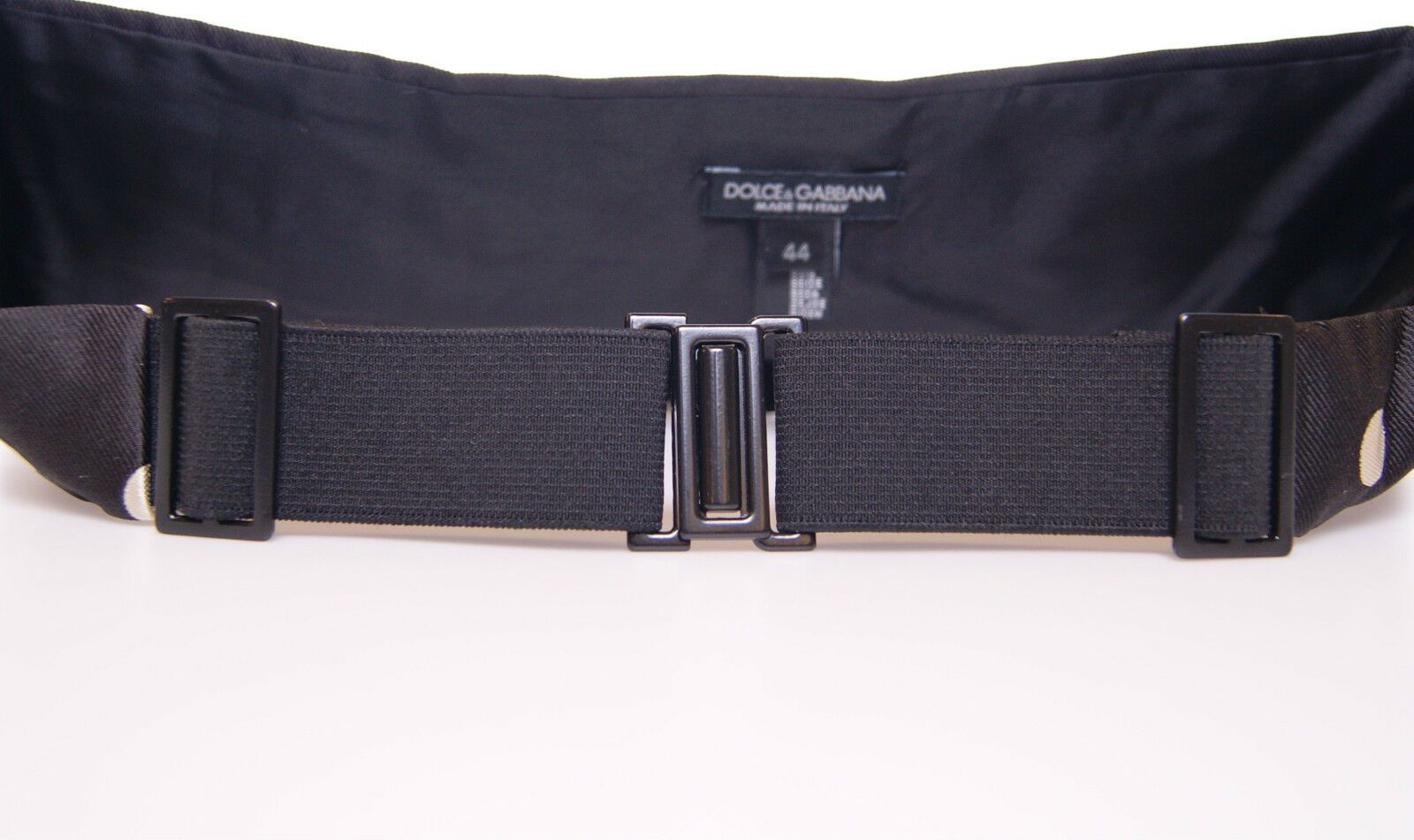 Black waist smoking tuxedo cummerbund belt by Dolce & Gabbana, featuring sleek fabric and classic design for formal attire.