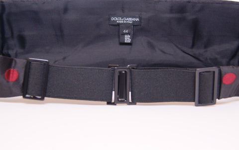 Black waist smoking tuxedo cummerbund belt by Dolce & Gabbana, with smooth fabric and elegant design for formal wear.