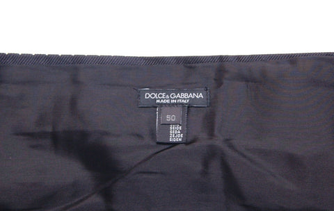 Black waist smoking tuxedo cummerbund belt by Dolce & Gabbana, with sleek fabric and elegant design for formal occasions.