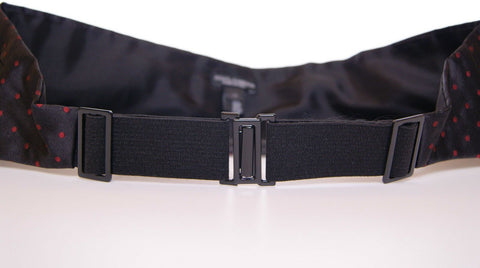 Black waist tuxedo cummerbund by Dolce & Gabbana, featuring a sleek, satin finish and elegant design for formal evening wear.