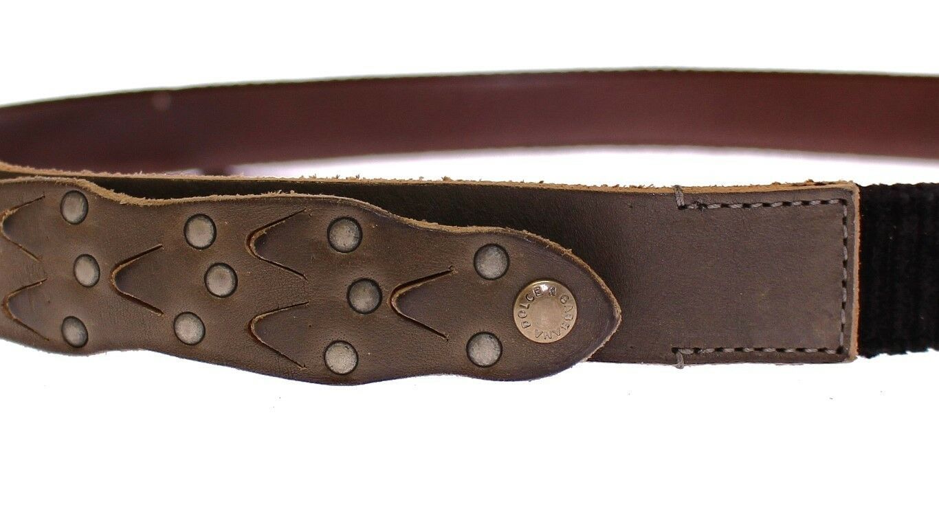 Brown leather Dolce & Gabbana logo belt with adjustable buckle and sleek design, featuring prominent brand logo detail.