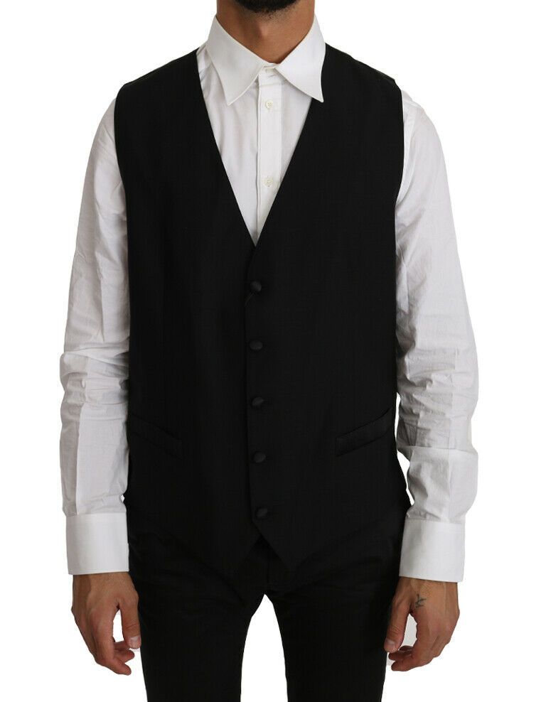 Black solid wool silk vest by Dolce & Gabbana, featuring a tailored fit and smooth fabric, displayed on a neutral background.