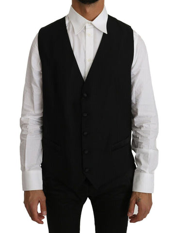 Black solid wool silk vest by Dolce & Gabbana, featuring a tailored fit and smooth fabric, displayed on a neutral background.