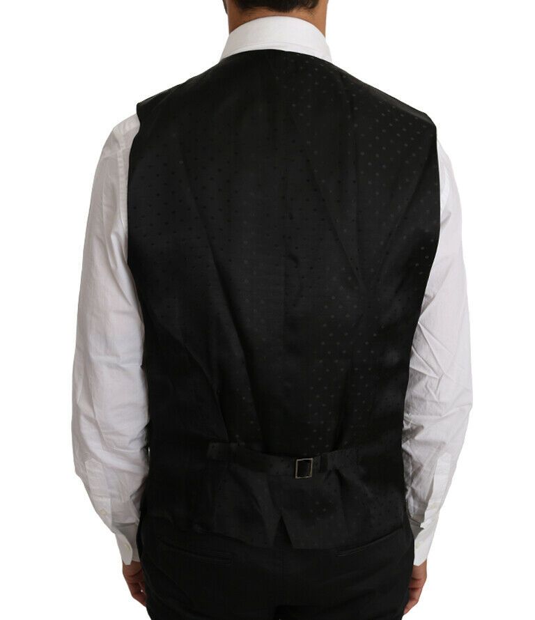 Black solid wool silk vest by Dolce & Gabbana, showcasing a tailored fit and smooth fabric texture.