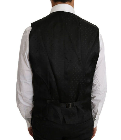 Black solid wool silk vest by Dolce & Gabbana, showcasing a tailored fit and smooth fabric texture.